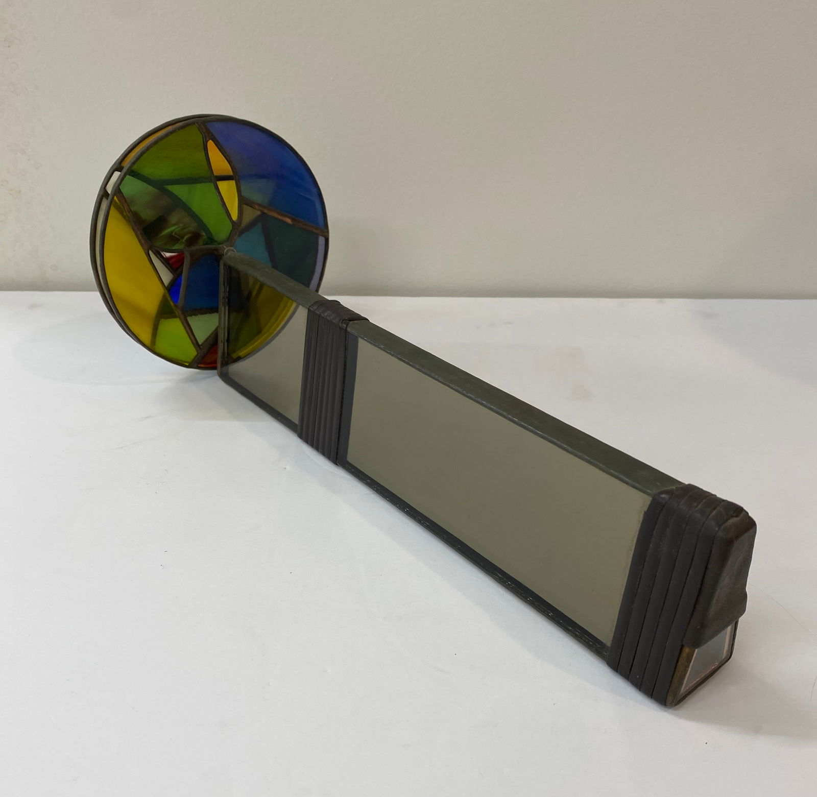 Large Stained Glass & Mirror Kaleidoscope with Agate Wheel: A vintage professional-grade kaleidoscope crafted from mirrored glass panels with decorative solder work. Features a rotating leaded "wheel" at the end, composed of various textured and colored