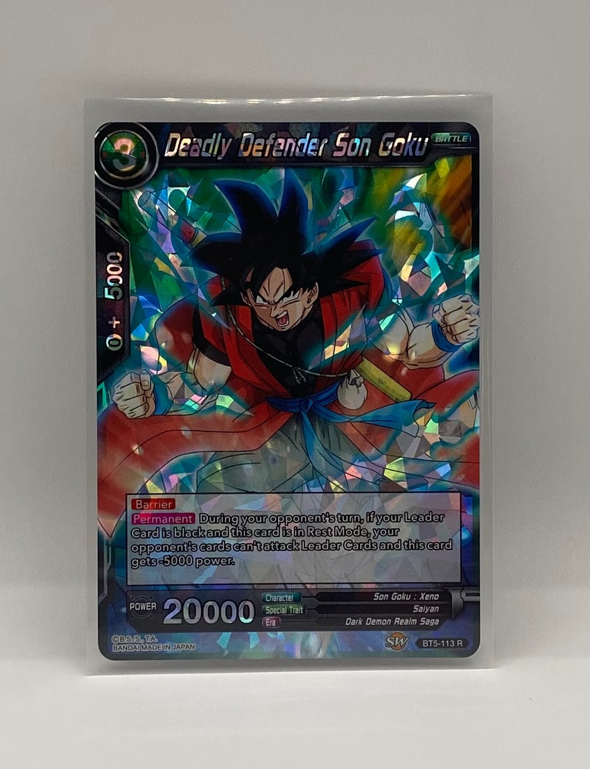 Dragon Ball Super TCG: Deadly Defender Son Goku (BT5-113 R) - Prism Foil: A Rare (R) prism foil card from the Miraculous Revival set (BT5). Featuring Son Goku: Xeno. Housed in a protective sleeve.