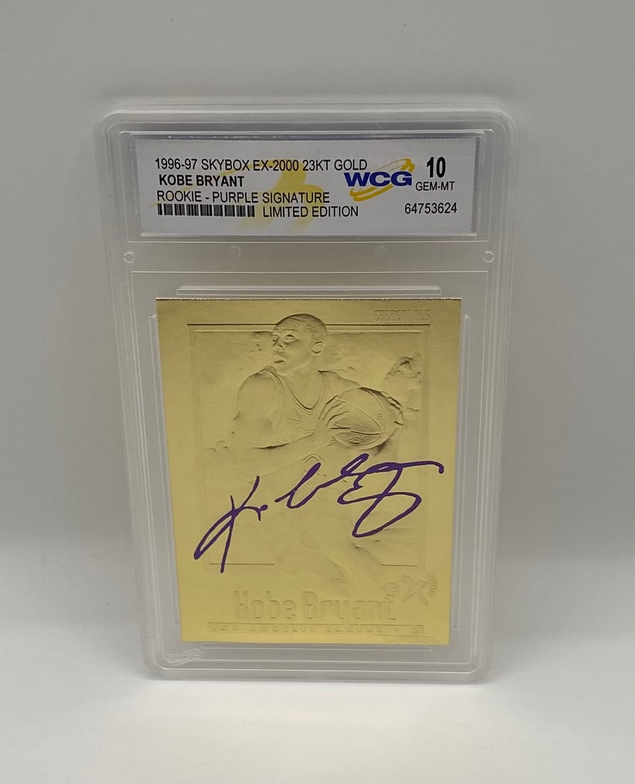 1996-97 SkyBox EX-2000 23KT Gold Kobe Bryant Rookie - WCG 10: Commemorating Kobe Bryant's rookie year, this 23KT gold card features a purple facsimile signature and etched "Credentials" design. A high-end tribute to the Mamba. Graded 10 Gem-MT by WCG. Serial: