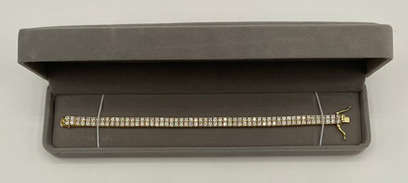 Stunning 18K Gold Plated Sterling Silver Double Row Tennis Bracelet: Elevate your collection with this exquisite Double Row Tennis Bracelet, meticulously crafted to deliver maximum brilliance and high-end appeal. This piece features a sophisticated 2-row design of bril