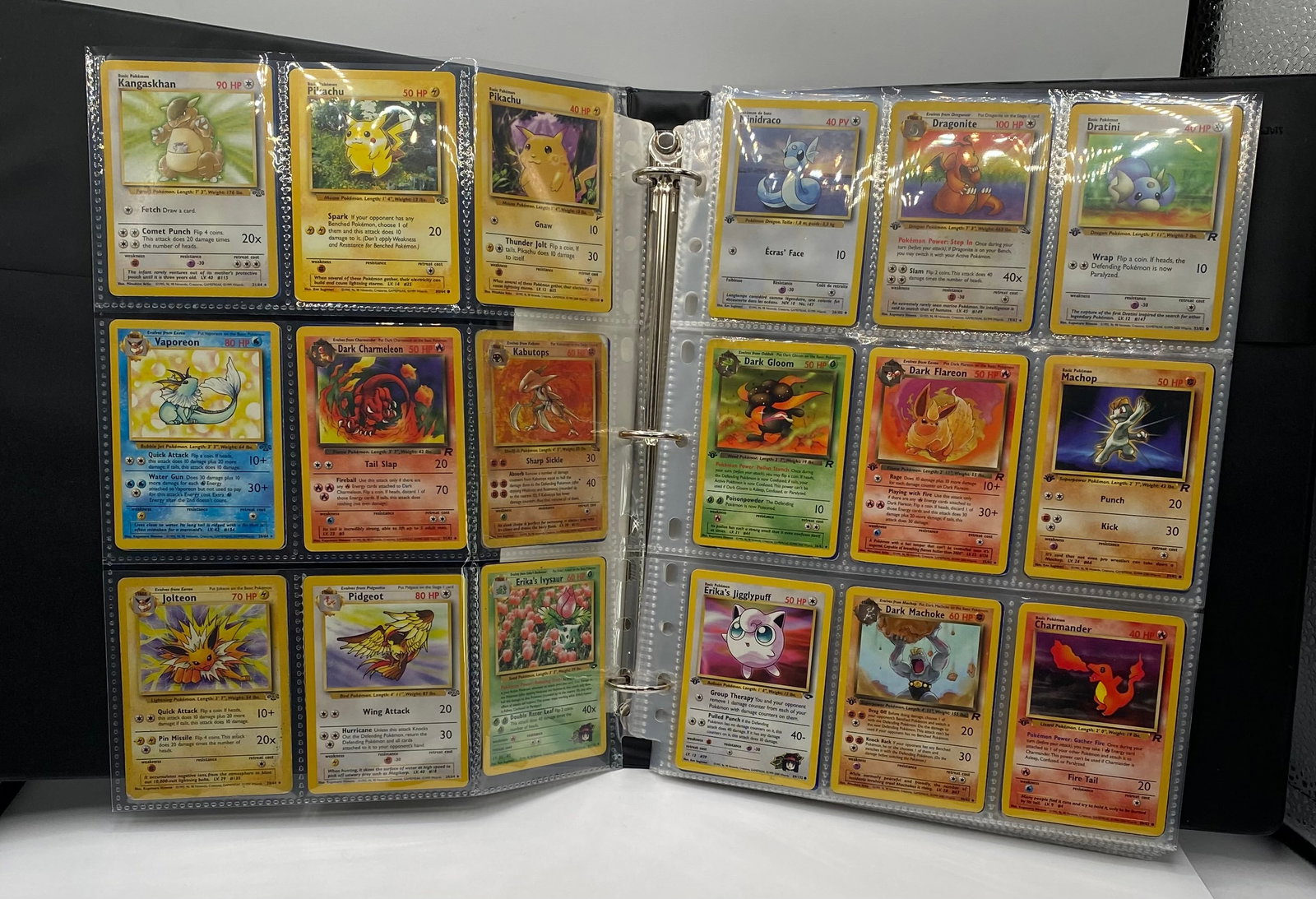 1999 1st Edition Pokemon & More Jolteon,Pikachu Dark Charmeleon Cards Binder: 1999 20000 Pokemon binder with some 1st edition cards in the mix and More. Kangaskhan, Pikachu, Pikachu, Minidraco (Dratini), Dratini, Machop, Erika's Jigglypuff, Charmander, Jolteon, Dark Charmeleon,