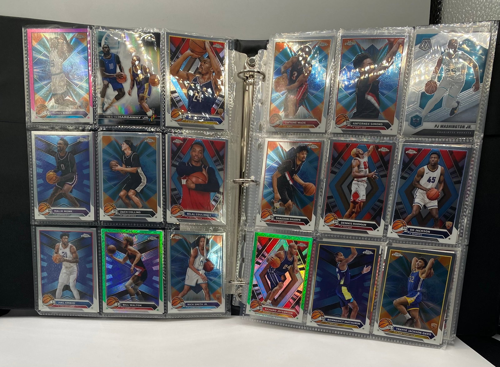 Tom Brady, Justin Jefferson RC, Shohei Ohtani, Topps Chrome Basketball & Football: An exceptional, multi-sport trading card collection housed neatly in a black 3-ring binder. This lot features an impressive array of modern football, basketball, and baseball stars, highlighted by an