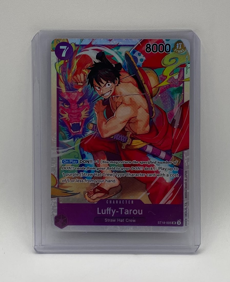 One Piece TCG Luffy-Tarou ST18-005 SR Alternate Art Holographic Card: Game: One Piece Card Game Card Name: Luffy-Tarou Card Number: ST18-005 Rarity: Super Rare (SR) / Alternate Art Promo Attributes: Purple Character Card, Straw Hat Crew, 7 Cost, 8000 Power, Strike