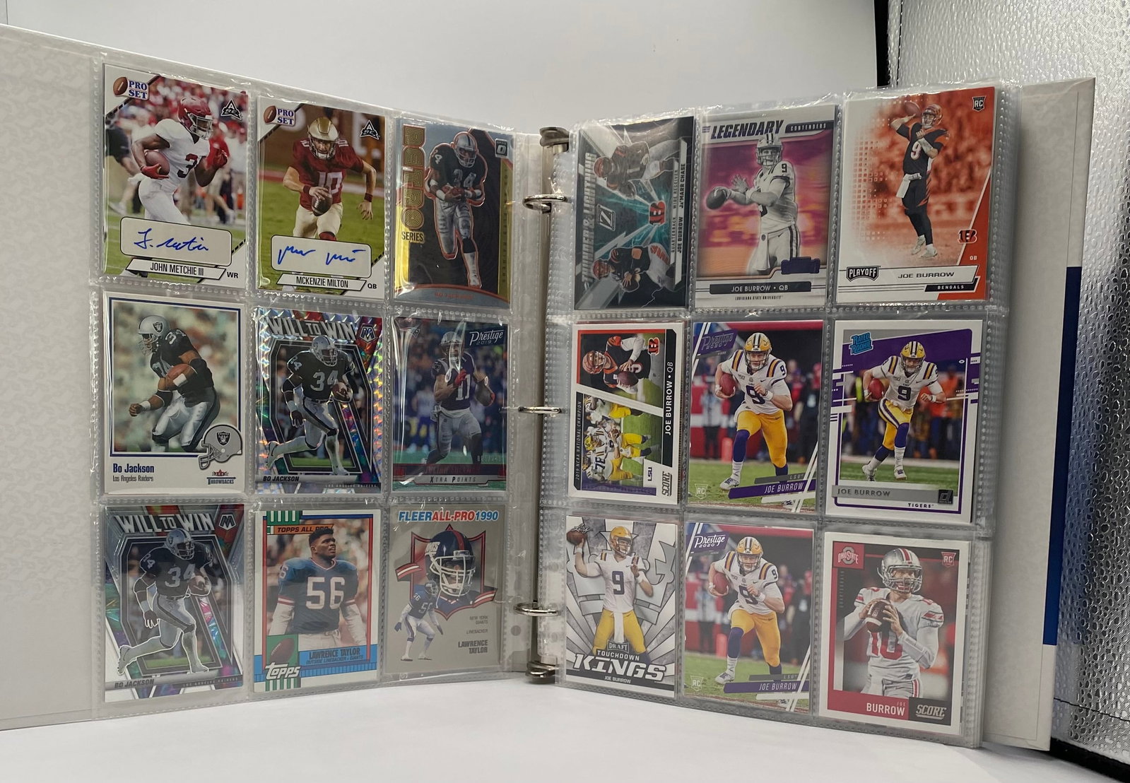 Joe Burrow, Jalen Hurts & Trevor Lawrence RC Cards, Autographs, Legends: Joe Burrow, Jalen Hurts & Trevor Lawrence RC Cards, Autographs, Legends And more. Binder has over 200 football cards