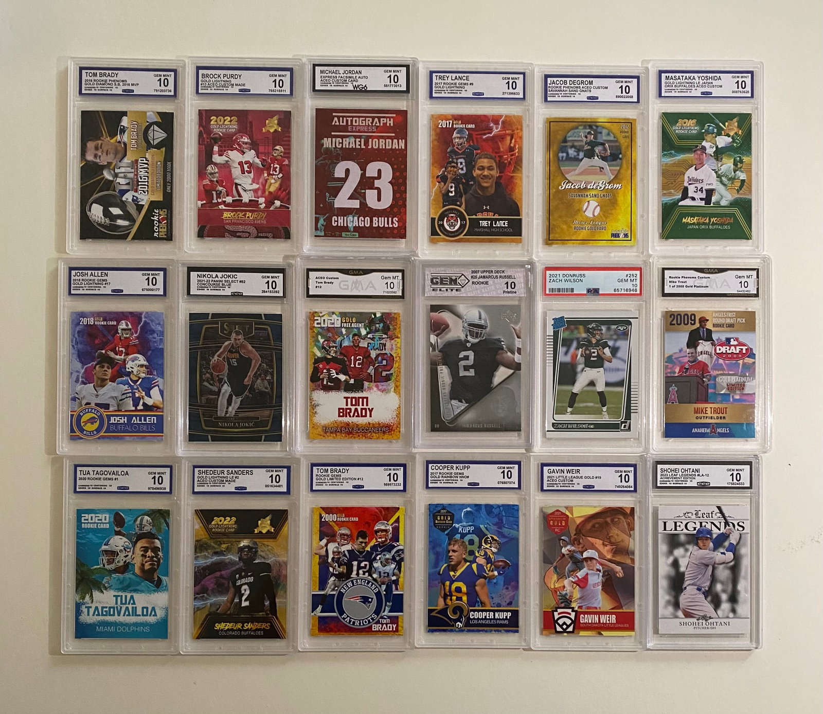 18 Graded Cards Michael Jordan, Tom Brady, Brock Purdy, Shohei Ohtani: An outstanding, high-caliber lot of 18 third-party graded sports cards, uniformly awarded the coveted Gem Mint 10 designation. This collection is heavily weighted toward elite NFL quarterbacks and