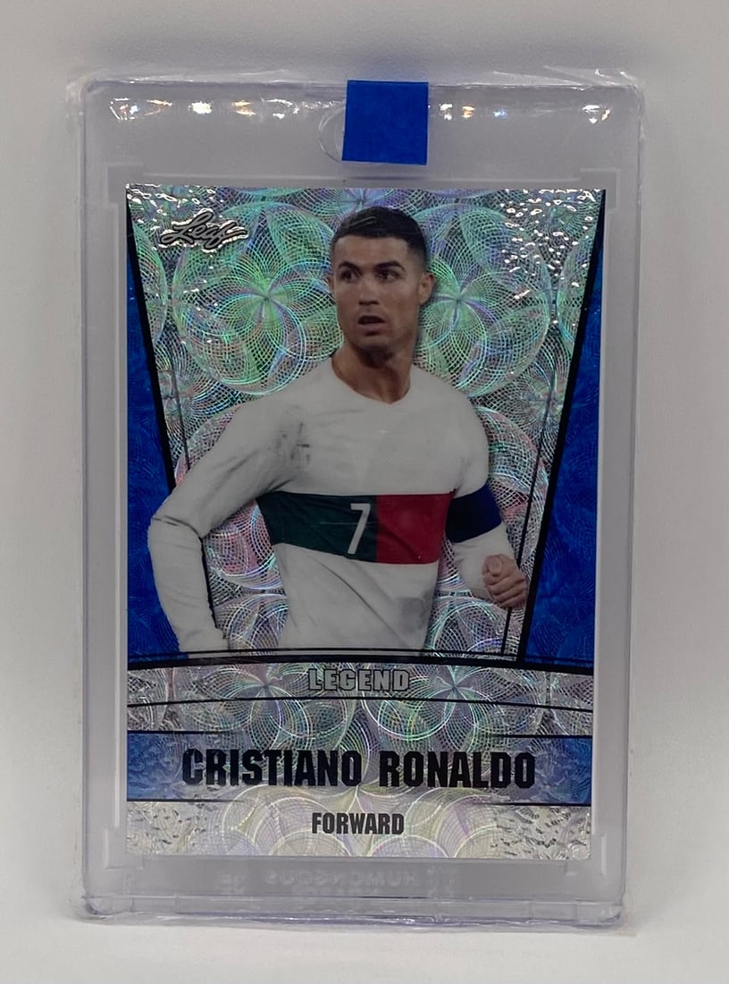 Cristiano Ronaldo Blue Border Circular Prism Refractor /20: Year/Set: 2023 Leaf Exclusive Legends Edition Player: Cristiano Ronaldo (Portugal) Designation: "Legend / Forward" Insert Finish: Kaleidoscopic / Circular Web Prism Refractor with Blue Borders