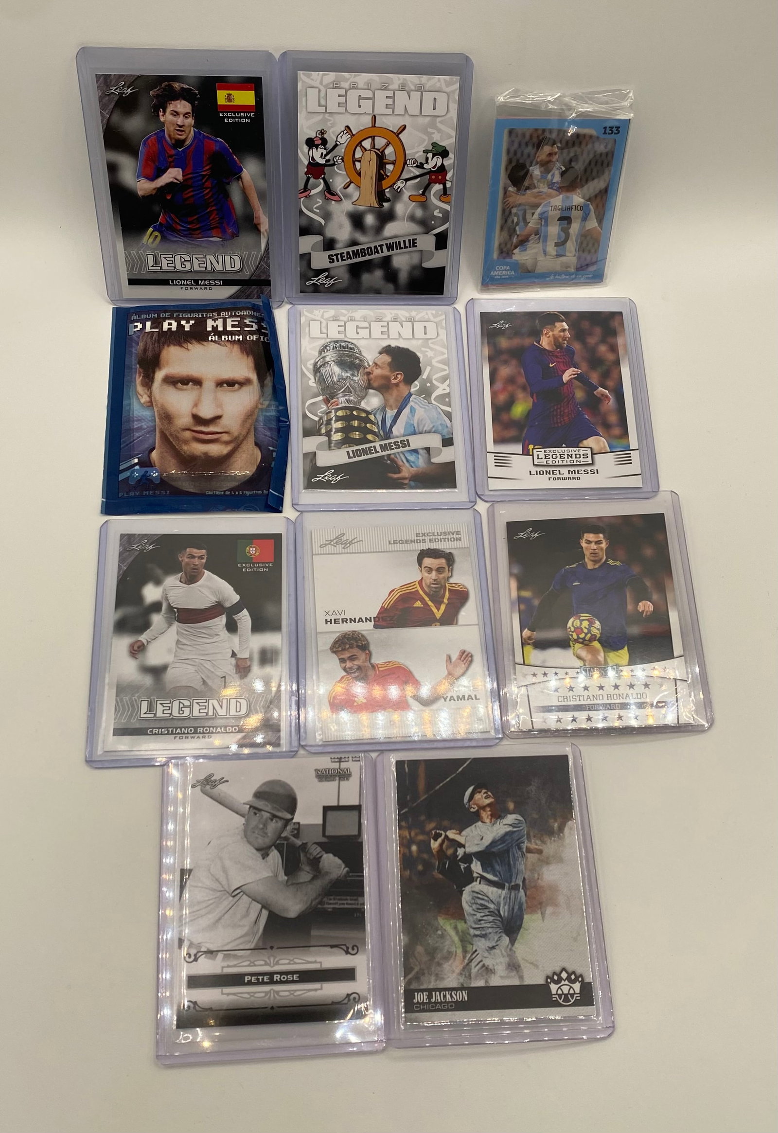 11-Pc Soccer & Baseball Card Lot - Messi, Cristiano Ronaldo, Yamal, Pete Rose: An expansive, multi-sport assortment loaded with modern soccer legends, rising superstars, and vintage baseball icons. This collection includes short-print inserts, parallels, and a sealed