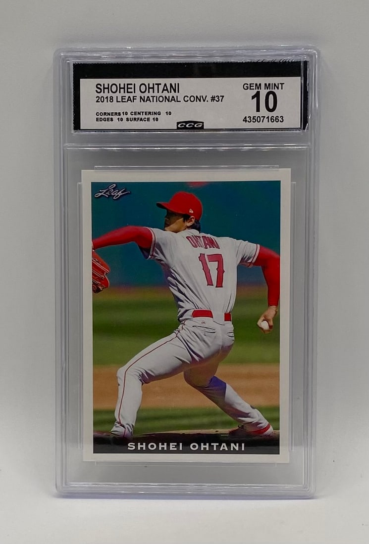 Shohei OhtaniRookie Card: An exceptional 2018 Leaf National Convention #37 Shohei Ohtani rookie card. This pristine example features the baseball phenom in his Los Angeles pitching mechanics. Graded Gem Mint 10 by CCG, the car