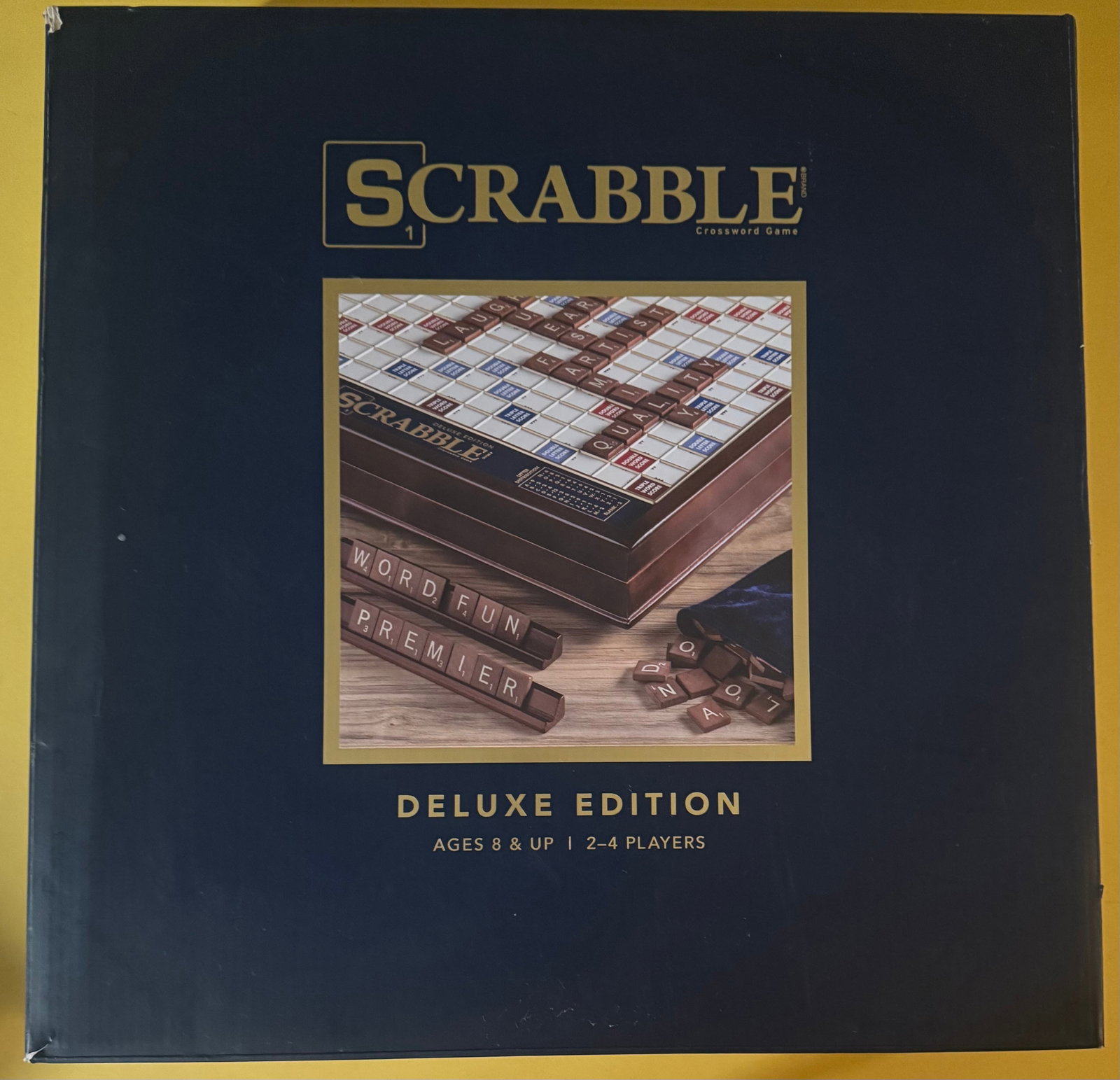 Hasbro / WS Game Company Scrabble Deluxe Edition - Factory Sealed: A premium, collector's edition of the classic crossword game, Scrabble Deluxe Edition, licensed by Hasbro and manufactured by WS Game Company. This high-end version elevates family game night with