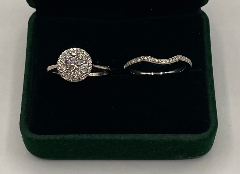 14k White Gold Diamond Halo Bridal Ring Set: Up for auction is a stunning, timeless 2-piece Bridal Set crafted in solid 14K White Gold. This beautifully coordinated set features a brilliant diamond cluster halo engagement ring paired perfectly