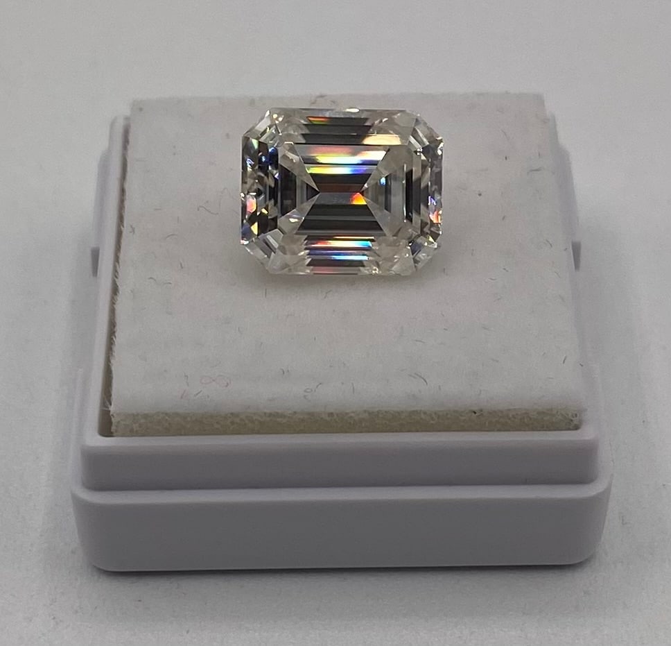 5.00 Carat Emerald Cut Moissanite Loose Gemstone - GRA Certified: Carat Weight: 5.00 Ct Shape/Cut: Emerald Cut (Step Cut) Certification: GRA Certified (Certificate included) Testing: Passes standard thermal diamond tester