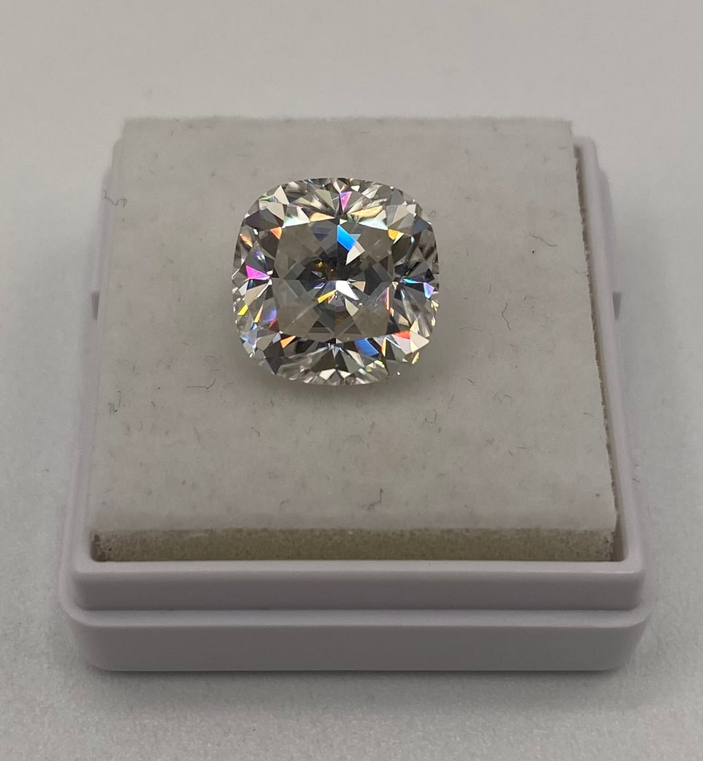 5.00 CT Cushion Cut Moissanite Loose Stone – GRA Certified: Carat Weight: 5.00 CT Gemstone Type: Authentic Moissanite Cut/Shape: Cushion Cut Testing: Passes standard thermal diamond tester Certification: Accompanied by an official GRA Certificate