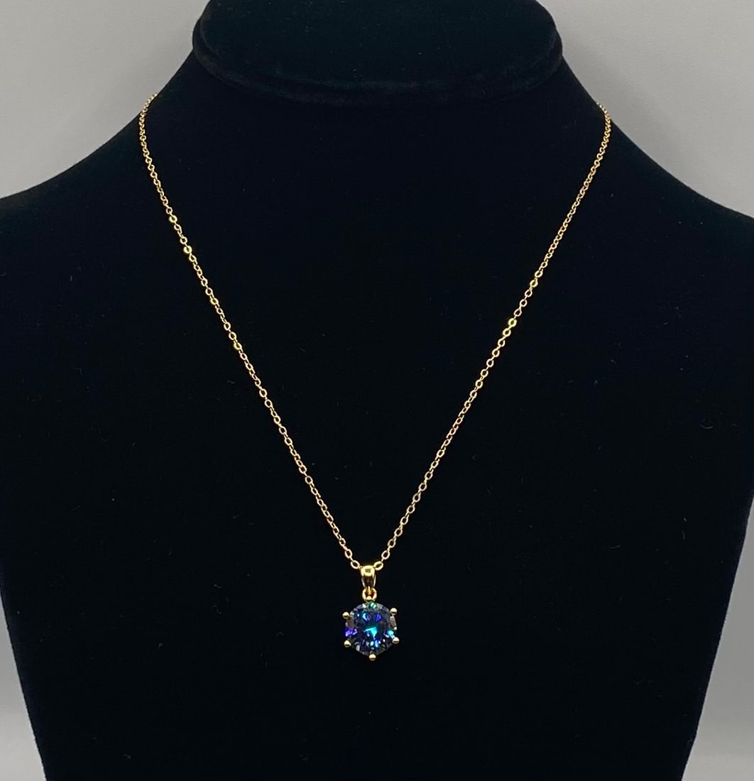 4.00 CT Rainbow Purple Moissanite Necklace 18K Gold: 4.00 CT Round Cut Peacock Rainbow Purple Moissanite Necklace 18K Gold. Material: 18K Yellow Gold plated over premium Sterling Silver Gemstone: Genuine Fancy Blue-Green Moissanite (Passes as diamond