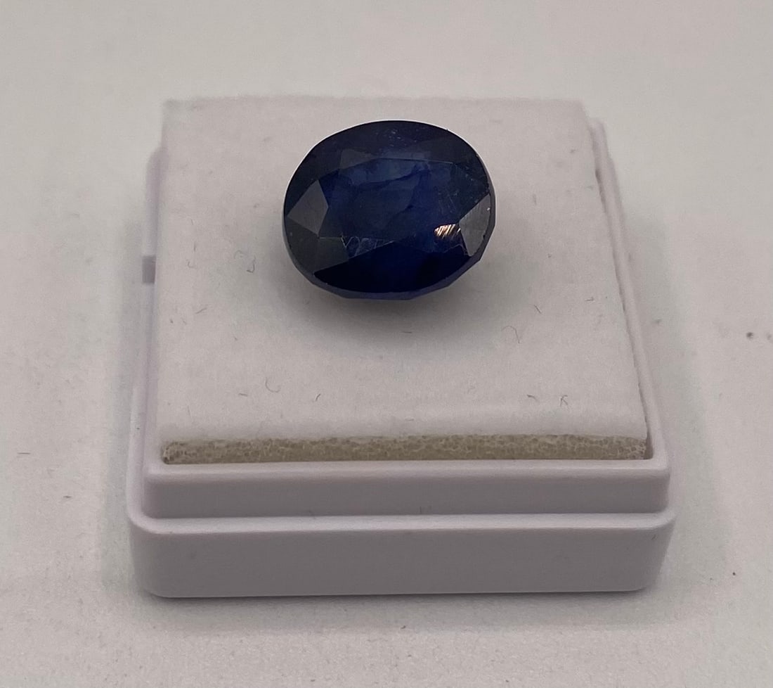 Natural Blue Sapphire Loose Gemstone - 8.01 Cts: Natural Blue Treated Sapphire Loose Gemstone - 8.01 Cts. Variety: Natural Sapphire Weight: 8.01 Cts Color: Blue Shape/Cut: Oval / Mixed Dimensions: 11.65 x 10.20 x 6.86 mm