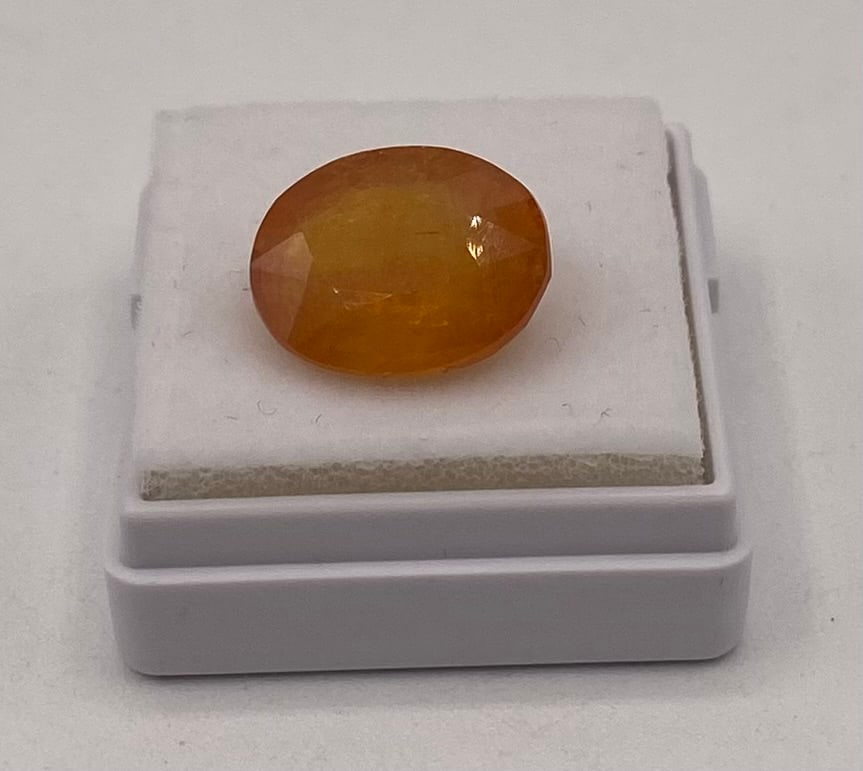 Natural Yellow Sapphire Loose Gemstone - 8.98 Cts: Natural Yellow Sapphire Loose Gemstone - 8.98 Cts. Variety: Natural Sapphire Weight: 8.98 Cts Color: Yellow Shape/Cut: Oval / Mixed Dimensions: 13.95 x 11.31 x 6.19 mm