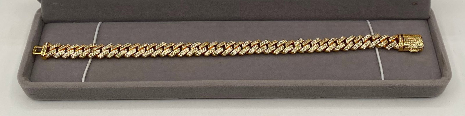 8mm VVS1 Moissanite Iced-Out Cuban Link Bracelet Gold Finish - 8" W/ Cert: 8mm VVS1 Moissanite Iced-Out Cuban Link Bracelet Gold Finish - 8" W/ Cert. Item Type: Classic Miami Cuban Link Bracelet (Iced-Out Prong Setting) Stone Type: Genuine Moissanite (Passes positive on