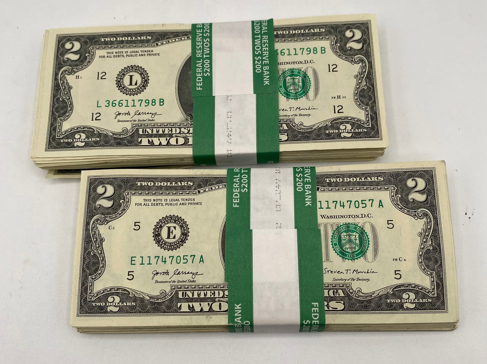 (Two (2) 100-Count Bundles of $2 Bills - $400 Total: Two (2) 100-Count Bundles of $2 Bills - $400 Total. They’re not consecutive serial numbers