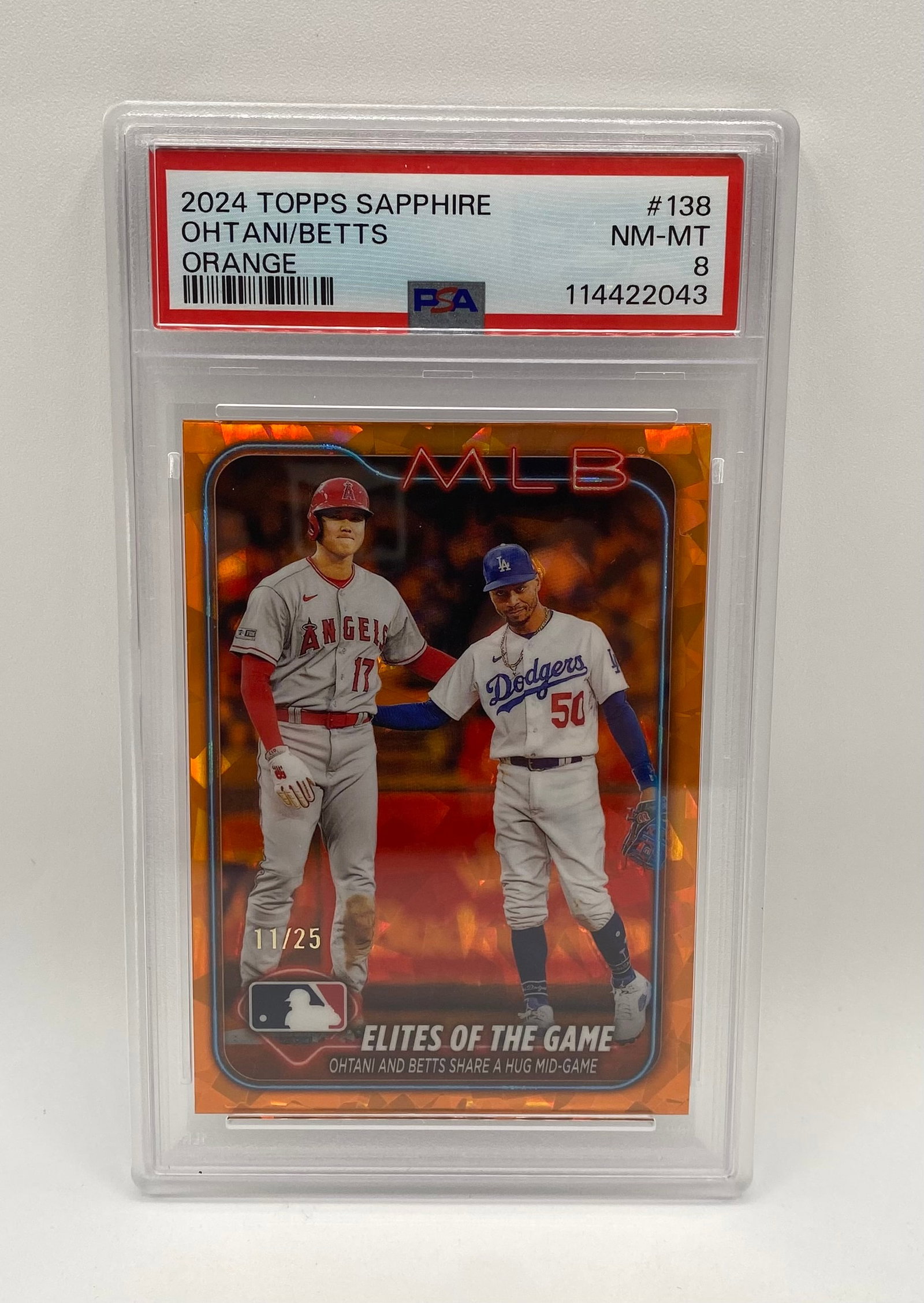 Shohei Ohtani Orange Sapphire /25 PSA: 2024 Topps Sapphire #138 Ohtani/Betts "Elites of the Game" Orange Refractor 11/25 — PSA 8 NM-MT
