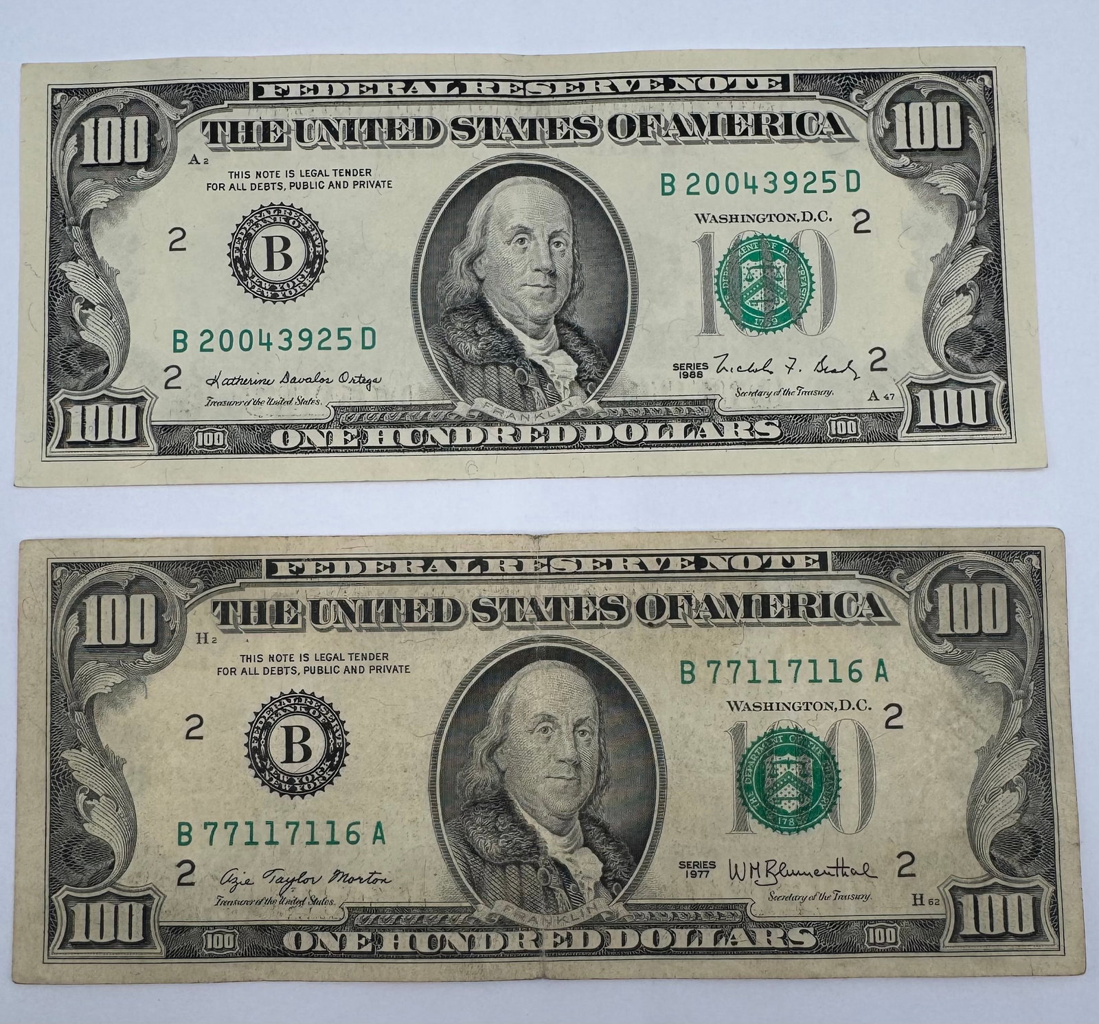 Pair of Vintage $100 Federal Reserve Notes - Series 1977 & Series 1988 (New York): Pair of Vintage $100 Federal Reserve Notes - Series 1977 & Series 1988 (New York). Face value $200