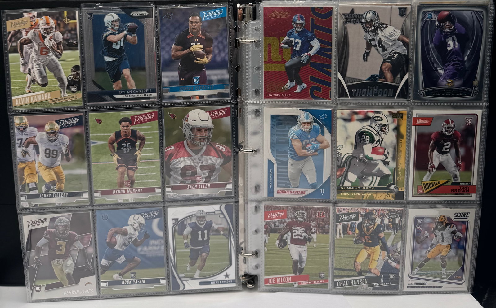 Sport Trading Cards Binder: Binder With mix Os inserts, Rookies & More sport trading cards. Binder has over 200 cards