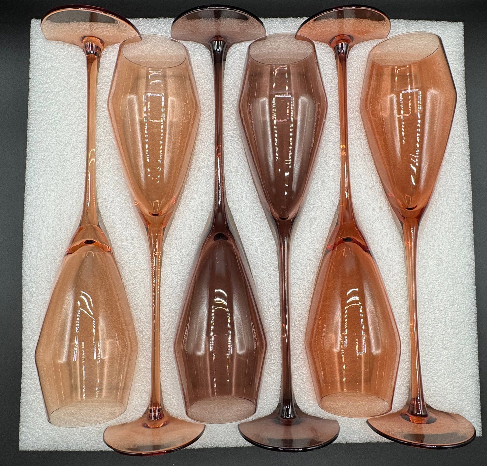 Set of (6) Hand-Blown Smoke & Blush Amber Champagne Flutes: Set of (6) Hand-Blown Smoke & Blush Amber Champagne Flutes – 11" H Item: Set of (6) Extra-Tall Tinted Champagne Flutes Quantity: 6 Flutes Total (4 Lighter Blush/Amber Tint, 2 Darker Smoke