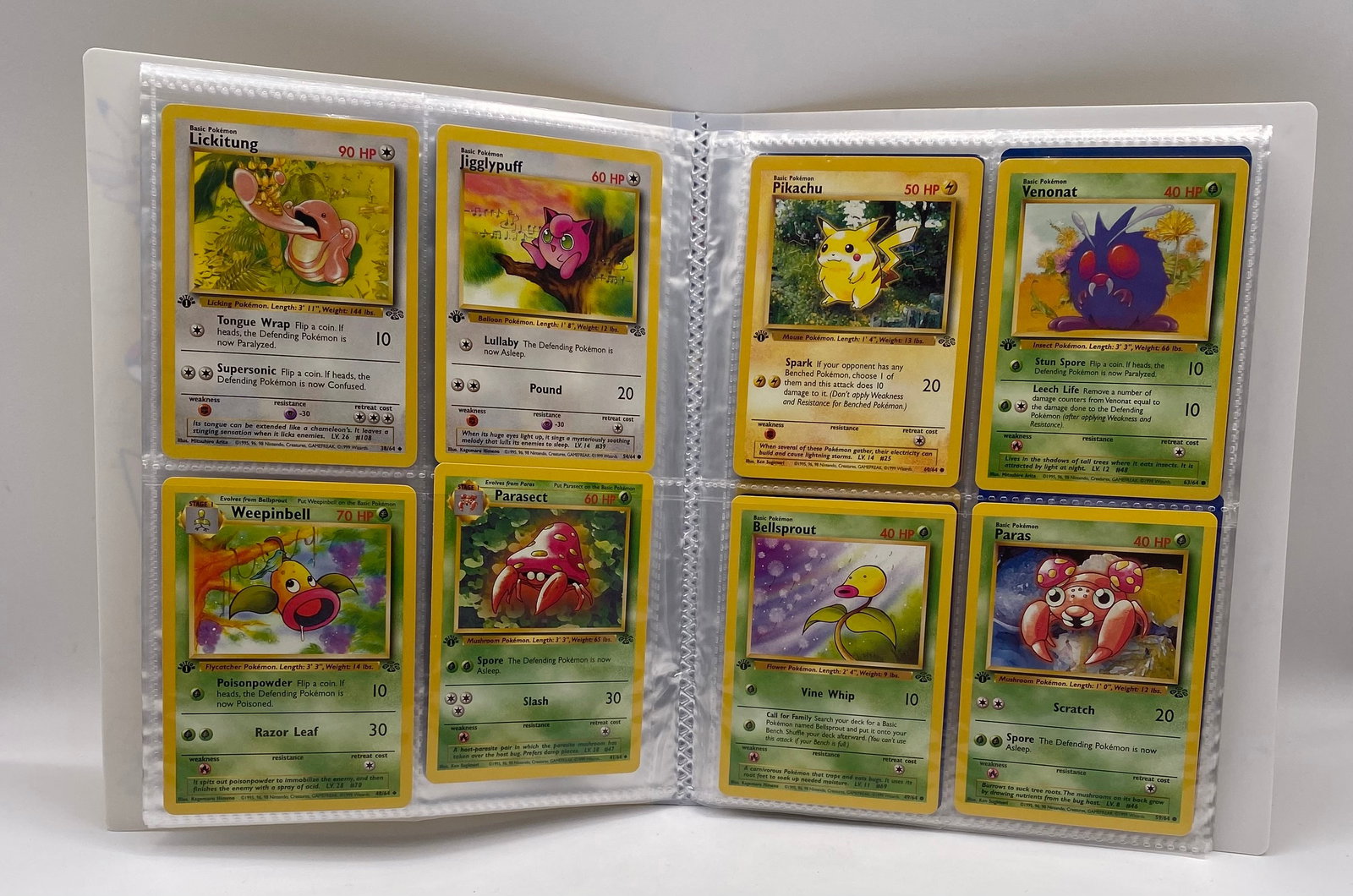1999 Pokemon 1st Edition Jungle Set Binder: 1999 Pokemon 1st Edition Jungle Set Binder. Binder has 32 first edition Pokemon cards