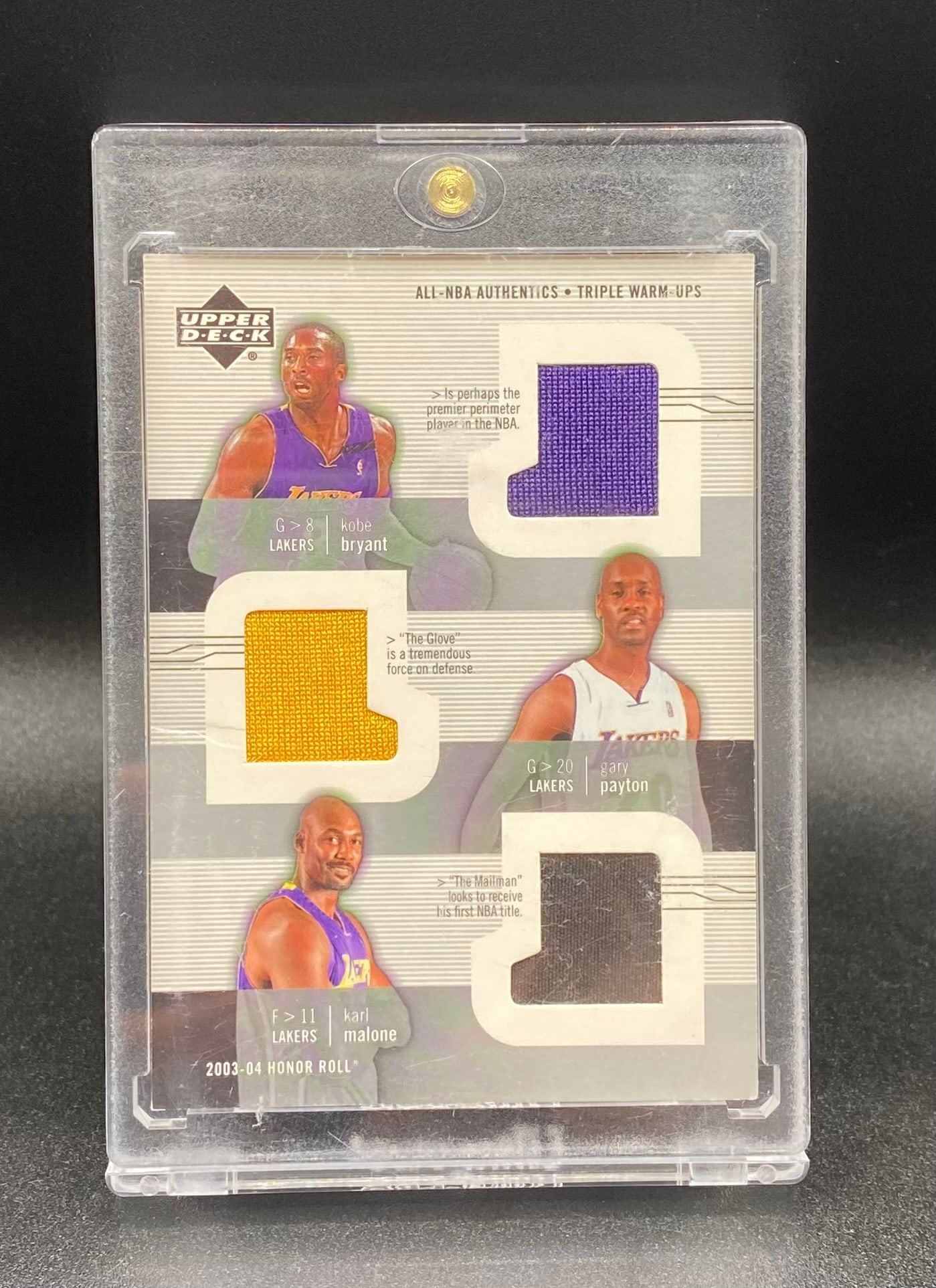Kobe Bryant , Gary Payton & Karl Malone Game Used Patch Card: 2003-04 Upper Deck Honor Roll Kobe Bryant / Gary Payton / Karl Malone Triple Game-Used Relic Card