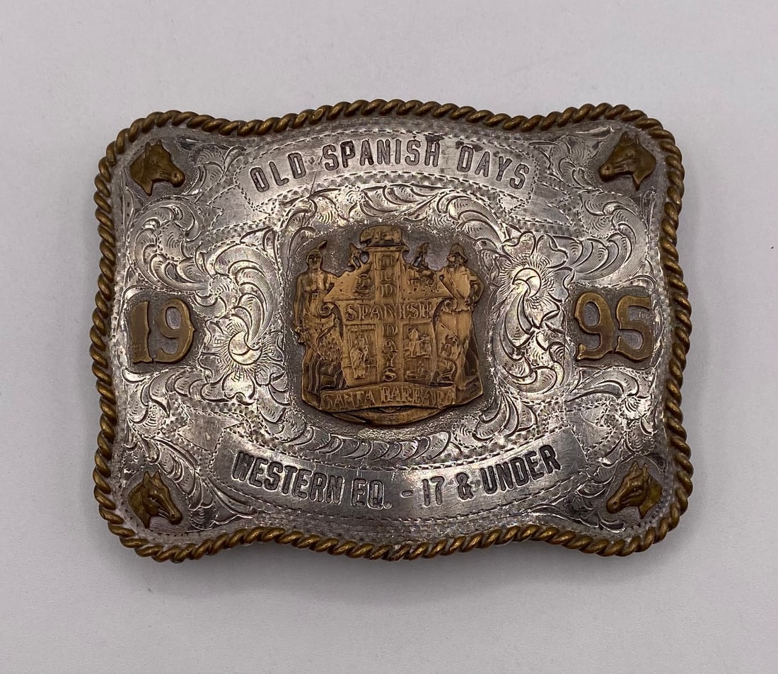 1995 Santa Barbara Old Spanish Days Western Eq. 17 & Under Trophy Belt Buckle: 1995 Santa Barbara Old Spanish Days Western Eq. 17 & Under Trophy Belt Buckle - Silverado Silver Overlay. An authentic 1995 Old Spanish Days Santa Barbara commemorative trophy belt buckle. Featuring d