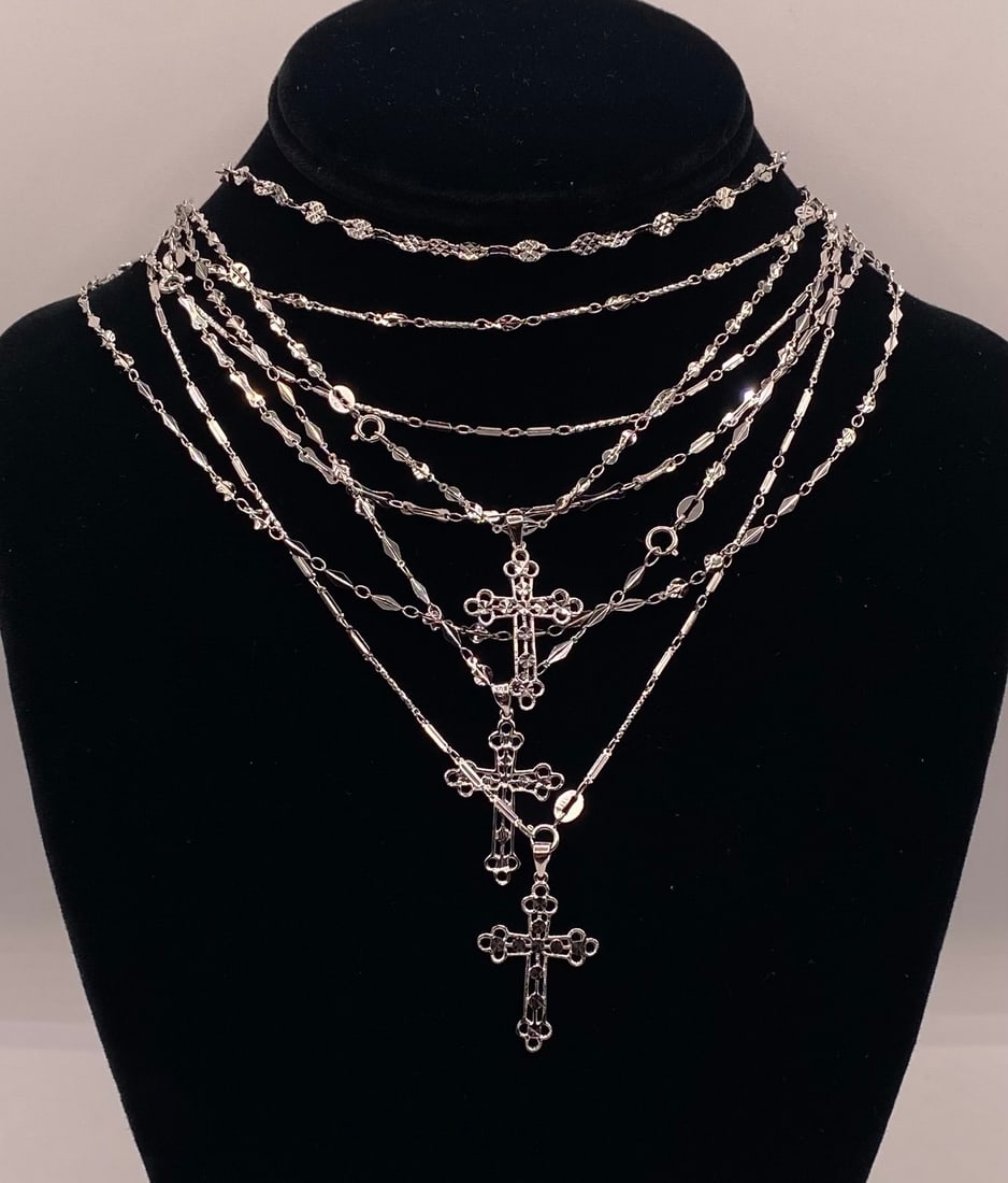 925 Sterling Silver Cross Pendant Necklaces & Diamond-Cut Station Chain Lot: 925 Sterling Silver Cross Pendant Necklaces & Diamond-Cut Station Chain Lot. multi-piece collection of fine .925 sterling silver chain necklaces and filigree cross pendants. The assortment features