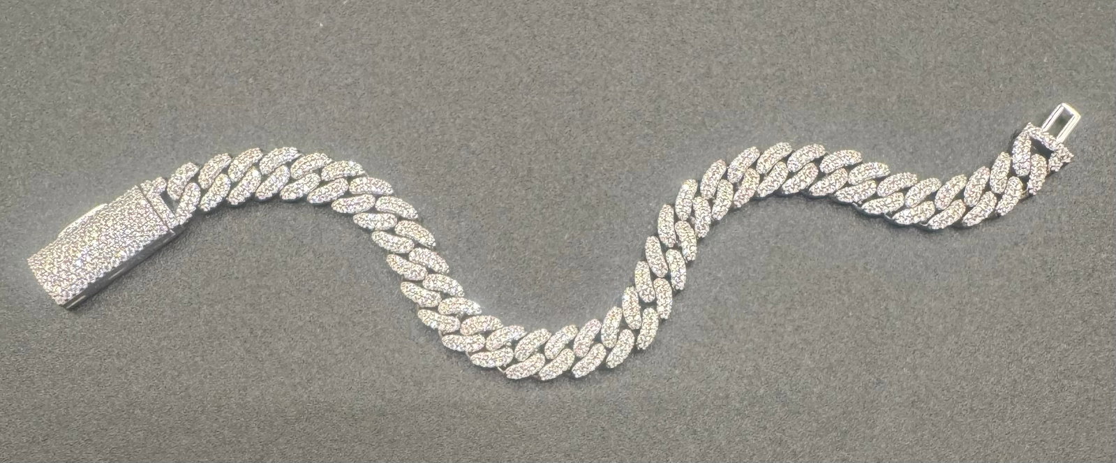 Cuban VVS Moissanite Bracelet: Cuban VVS Moissanite Bracelet. Stone color D. It comes with certificate. Length: 8 inches