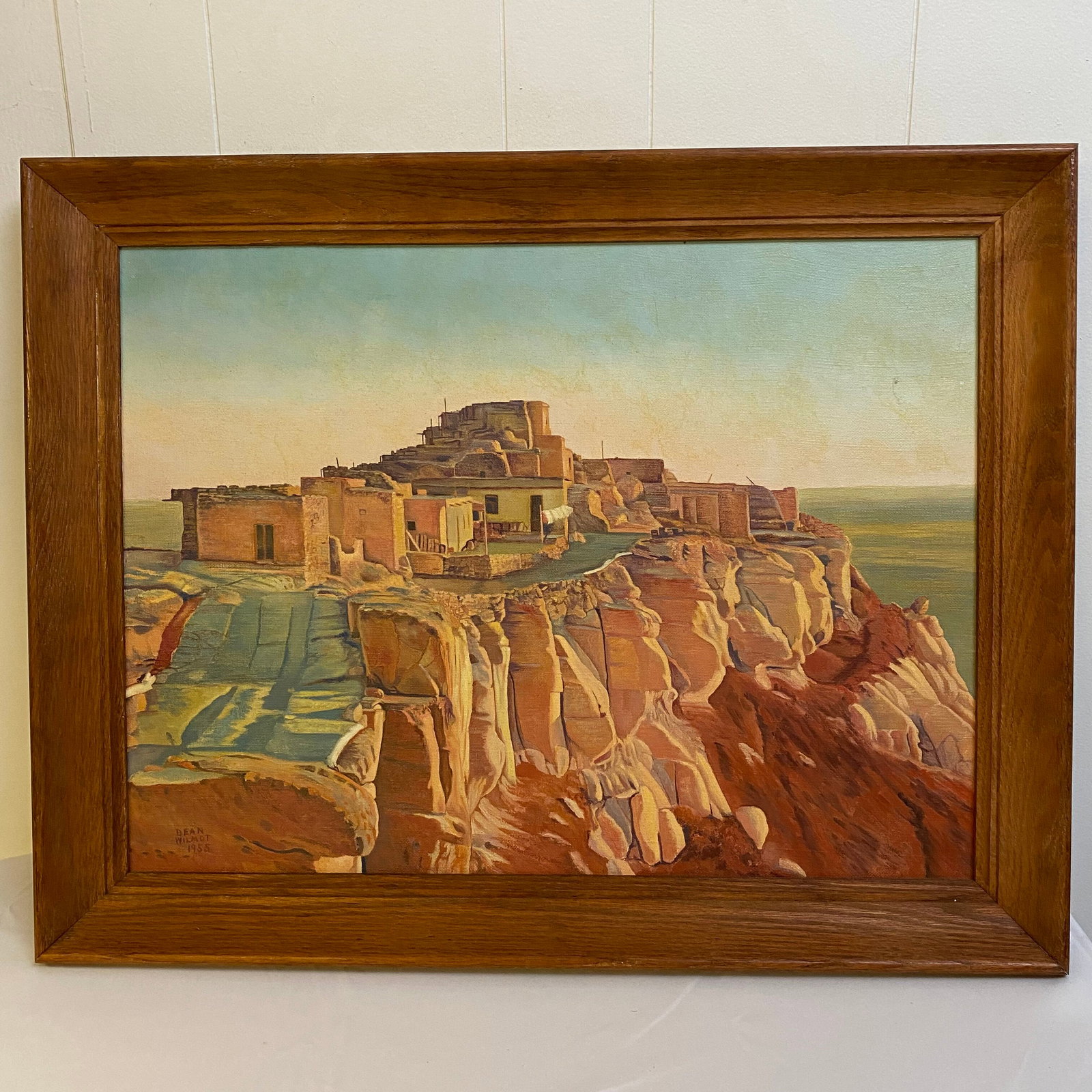 Dean Wilmot signed painting on Canvas Village on a Mountain: Dean Wilmot signed painting on Canvas Village on a Mountain in wood frame 1955 mid century painting