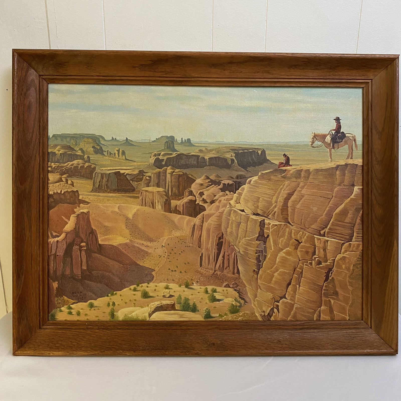 Dean Wilmot Southwestern Country Side with Men on Horses: Dean Wilmot Southwestern Country Side with Men on Horses painting on canvas in wood frame 1955 mid century painting