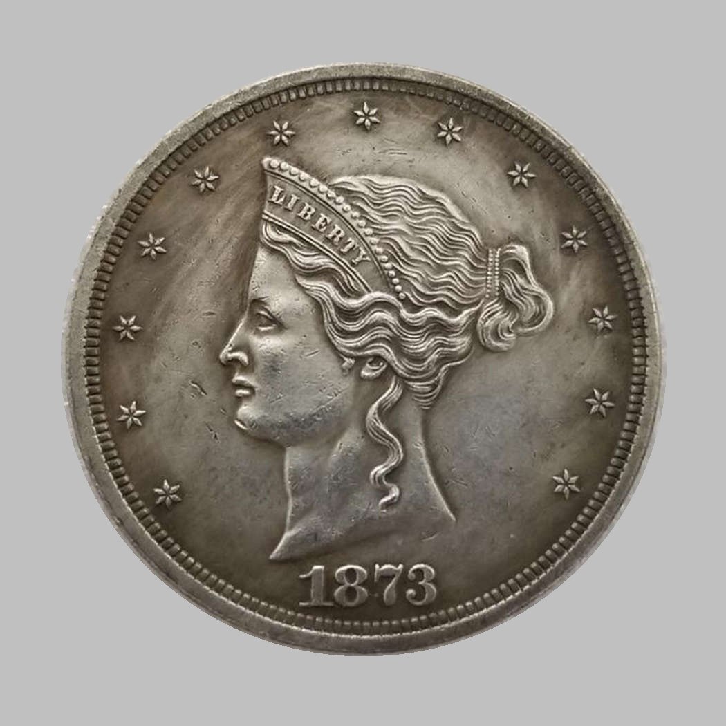 1873 TRADE DOLLARS LIBERTY SILVER COIN (1 of 2)