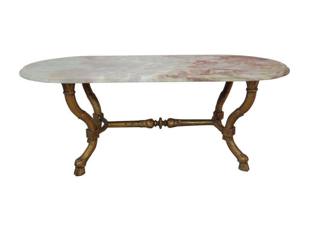 Cast Iron Onxy Table: cast iron onxy top hoof foot coffee table, 45''w, 19.75''d,18''h.