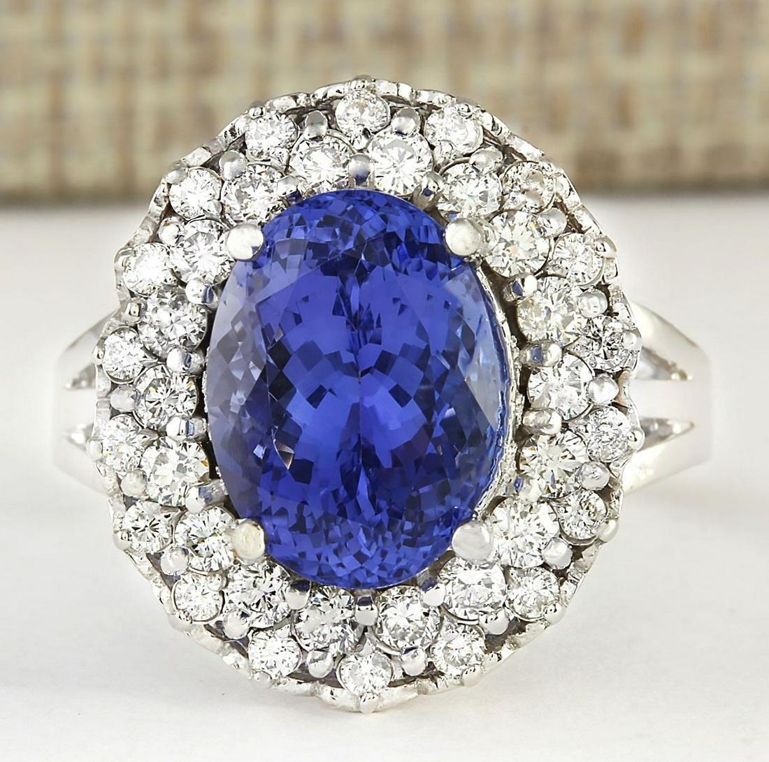 7.82 CTW Natural Blue Tanzanite And Diamond Ring 14k: 7.82 CTW Natural Blue Tanzanite And Diamond Ring 14k Solid White Gold Manufacturer's Suggested Retail Price: $ 11250.00 Stamped: 14K Ring Size: 8 Total Ring Weight: 10 Grams Diamond Weight: Total Natu