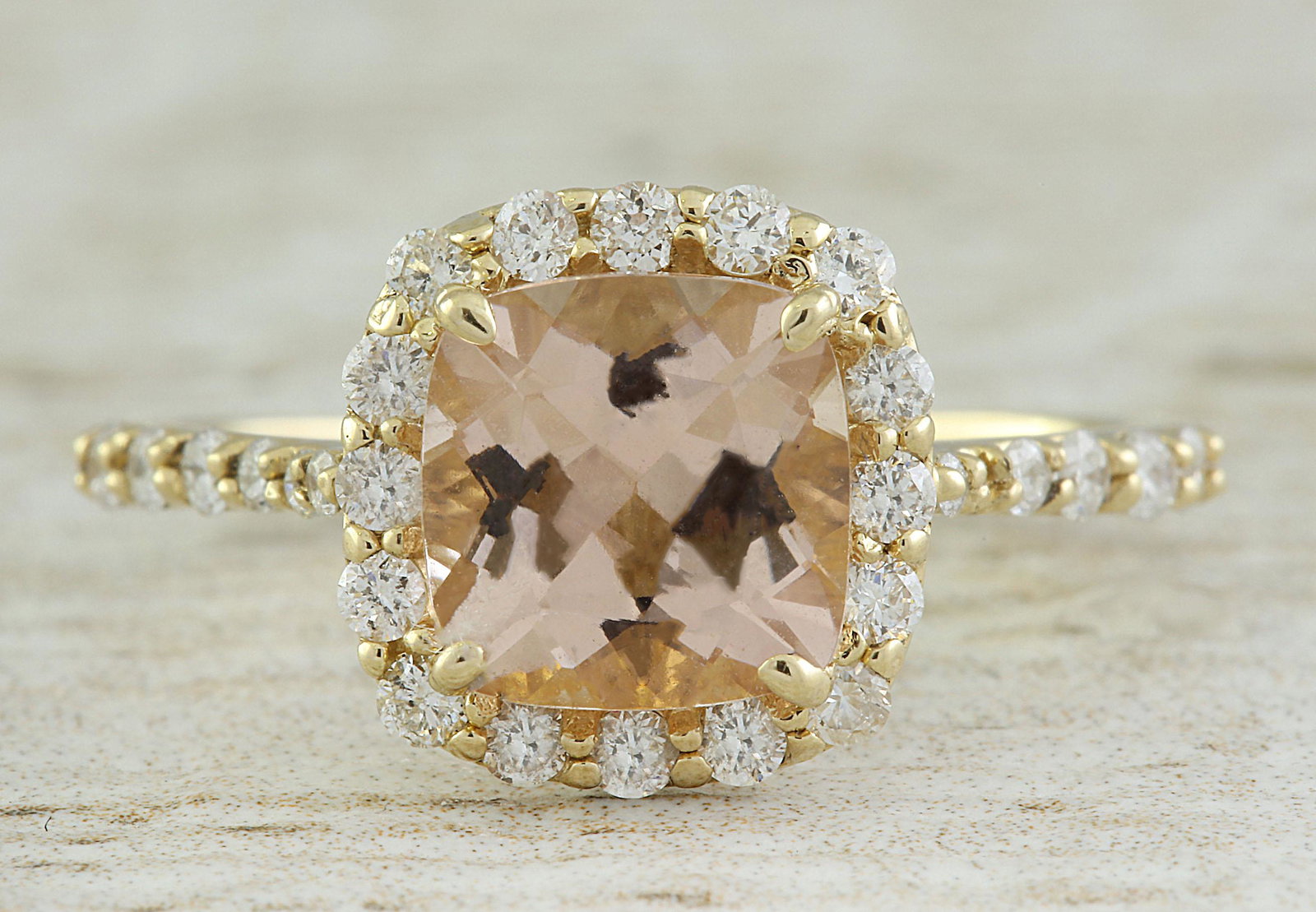 2.32 CTW Morganite 18K Yellow Gold Diamond Ring: 2.32 CTW Morganite 18K Yellow Gold Diamond Ring Manufacturer's Suggested Retail Price: $ 3100.00 Stamped: 18K Total Ring Weight: 3 Grams Morganite Weight: 1.82 Carat (7.60x7.50 Millimeters) Diamond We