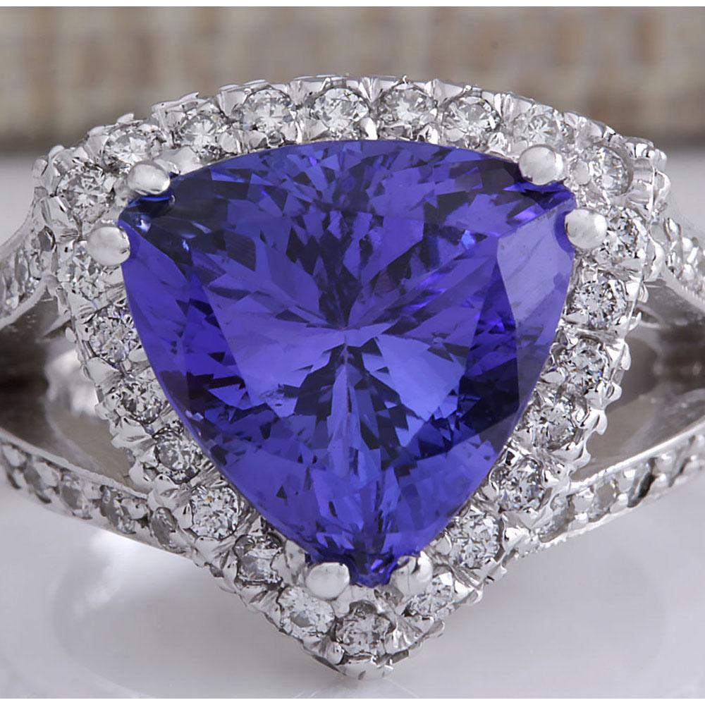 7.72 CTW Natural Blue Tanzanite And Diamond Ring 18K: 7.72 CTW Natural Blue Tanzanite And Diamond Ring 18K Solid White Gold Manufacturer's Suggested Retail Price: $ 12050.00 Stamped: 18K Ring Size: 6.25 Total Ring Weight: 10.5 Grams Diamond Weight: Total