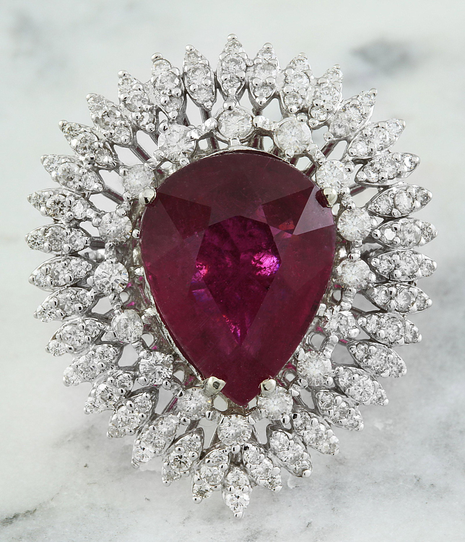 10.30 CTW Rubelite 18K White Gold Diamond Ring: 10.30 CTW Rubelite 18K White Gold Diamond Ring Manufacturer's Suggested Retail Price: $ 10900.00 Stamped: 18K Total Ring Weight: 11.8 Grams Rubelite Weight: 8.70 Carat (15.00x12.00 Millimeters) Diamon