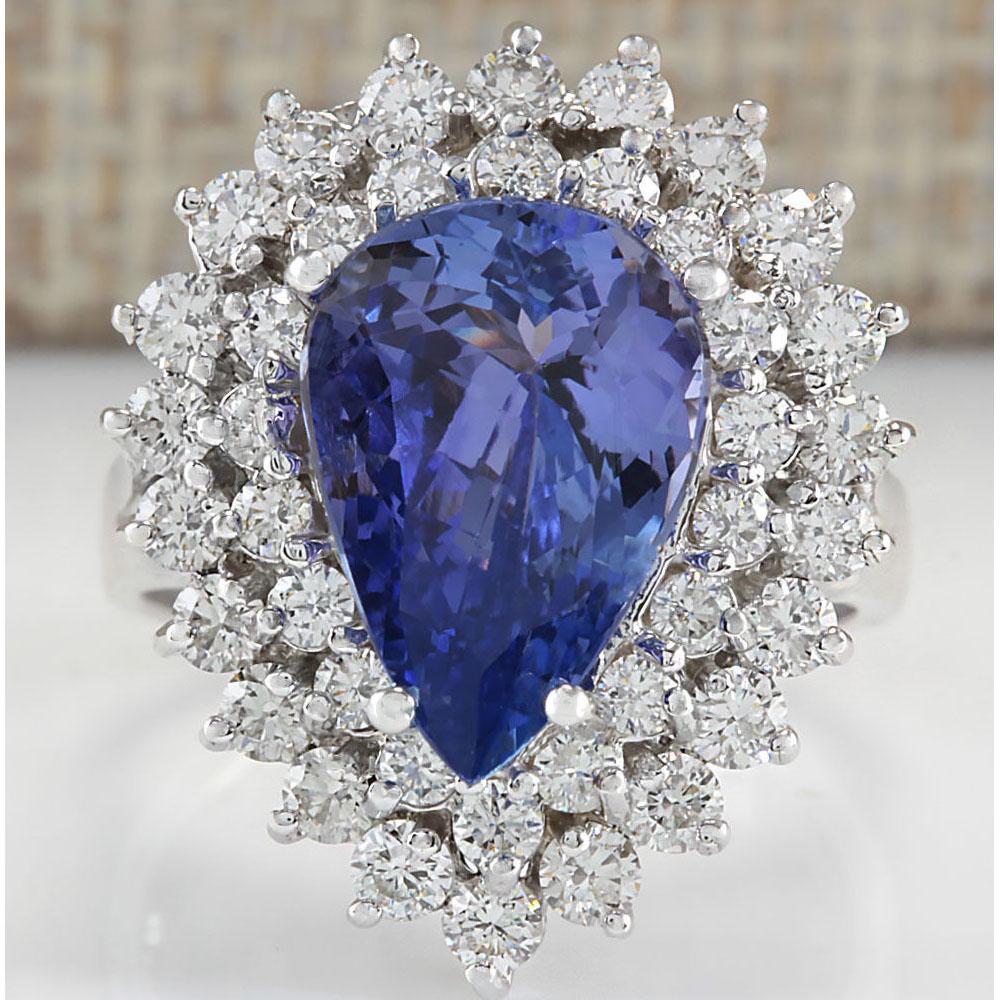 5.75 CTW Natural Tanzanite And Diamond Ring In 18K: 5.75 CTW Natural Tanzanite And Diamond Ring In 18K White Gold Manufacturer's Suggested Retail Price: $ 10200.00 Stamped: 18K Ring Size: 6 Total Ring Weight: 8 Grams Diamond Weight: Total Natural diamo