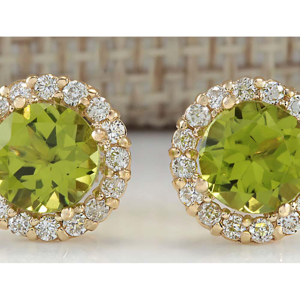 3.65 CTW Natural Peridot And Diamond Earrings 14k Solid: 3.65 CTW Natural Peridot And Diamond Earrings 14k Solid Yellow Gold Manufacturer's Suggested Retail Price: $ 3500.00 Stamped: 14K Total Earring Weight: 2Grams Diamond Weight: Total Natural diamond wei