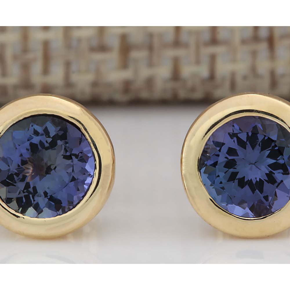 2.60 CTW Natural Tanzanite Earrings 18K Solid Yellow: 2.60 CTW Natural Tanzanite Earrings 18K Solid Yellow Gold Manufacturer's Suggested Retail Price: $ 2450.00 Stamped: 18K Total Earring Weight: 1.7Grams Gemstone Weight: Total Natural Tanzanite Weight i