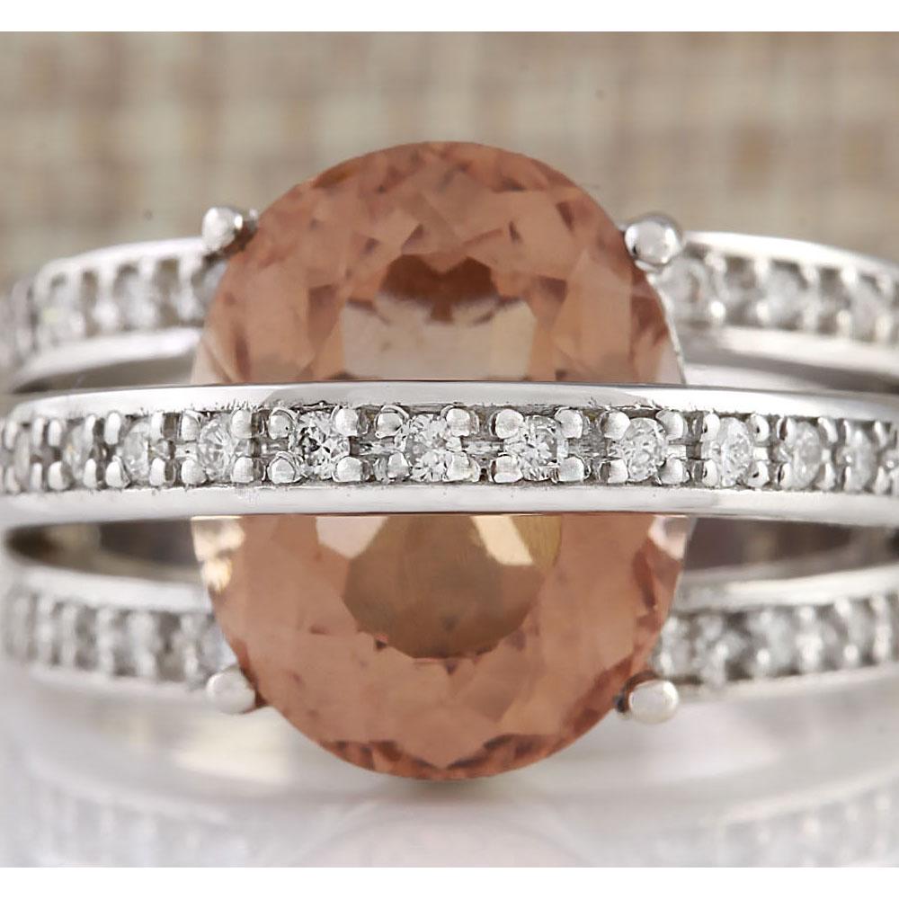 8.05 CTW Natural Morganite And Diamond Ring 14k Solid: 8.05 CTW Natural Morganite And Diamond Ring 14k Solid White Gold Manufacturer's Suggested Retail Price: $ 7150.00 Stamped: 14K Ring Size: 6.75 Total Ring Weight: 13.2 Grams Diamond Weight: Total Natur