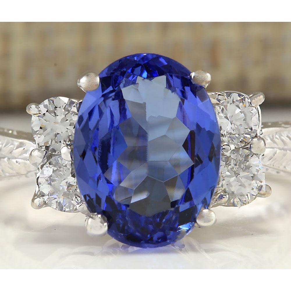 4.19 CTW Natural Tanzanite And Diamond Ring In 14K: 4.19 CTW Natural Tanzanite And Diamond Ring In 14K White Gold Manufacturer's Suggested Retail Price: $ 9300.00 Stamped: 14K Ring Size: 6.5 Total Ring Weight: 5.2 Grams Diamond Weight: Total Natural di