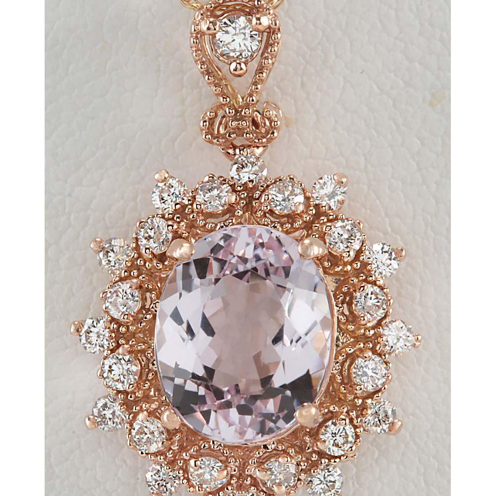4.79 CTW Natural Morganite And Diamond Pendant In 14K: 4.79 CTW Natural Morganite And Diamond Pendant In 14K Solid Rose Gold Manufacturer's Suggested Retail Price: $ 3100.00 Stamped: 14K Total Pendant Weight: 4Grams Diamond Weight: Total Natural diamond w