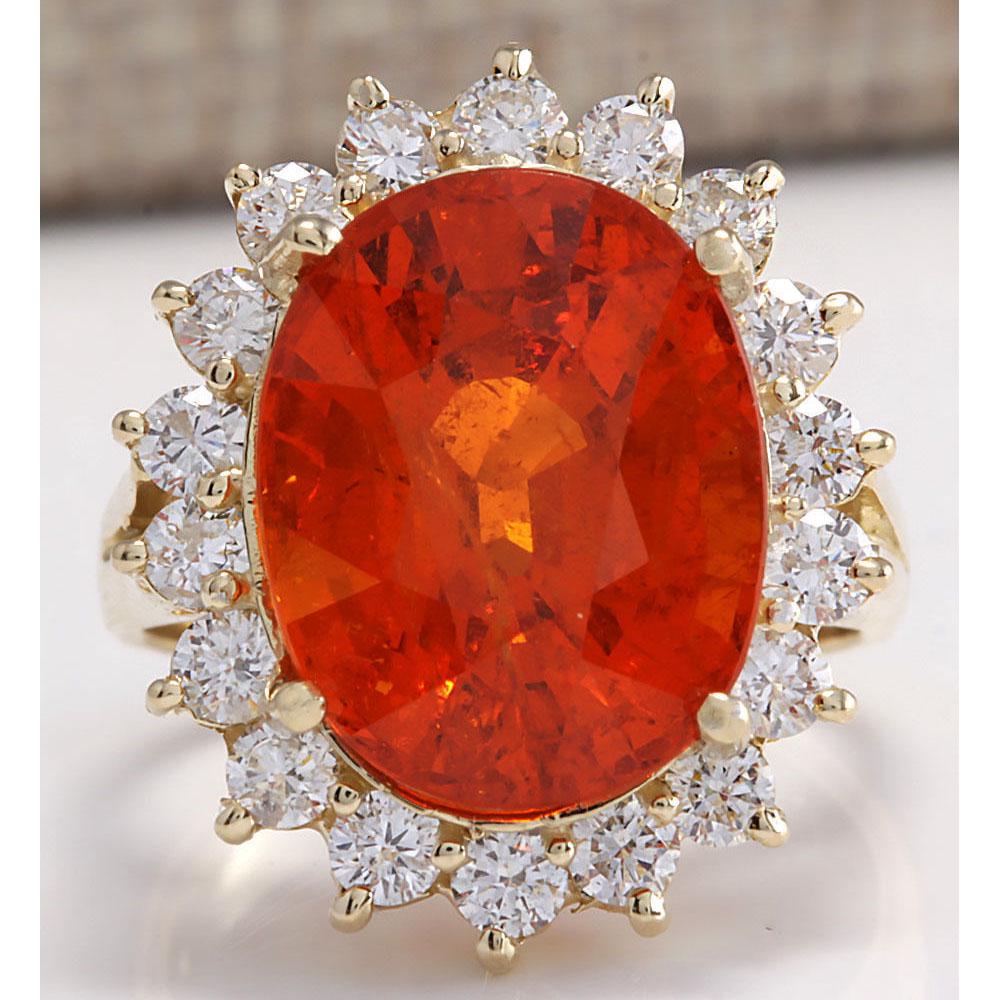 12.41 CTW Natural Mandarin Garnet And Diamond Ring 14K: 12.41 CTW Natural Mandarin Garnet And Diamond Ring 14K Solid Yellow Gold Manufacturer's Suggested Retail Price: $ 10200.00 Stamped: 14K Ring Size: 5.25 Total Ring Weight: 6.5 Grams Diamond Weight: Tot