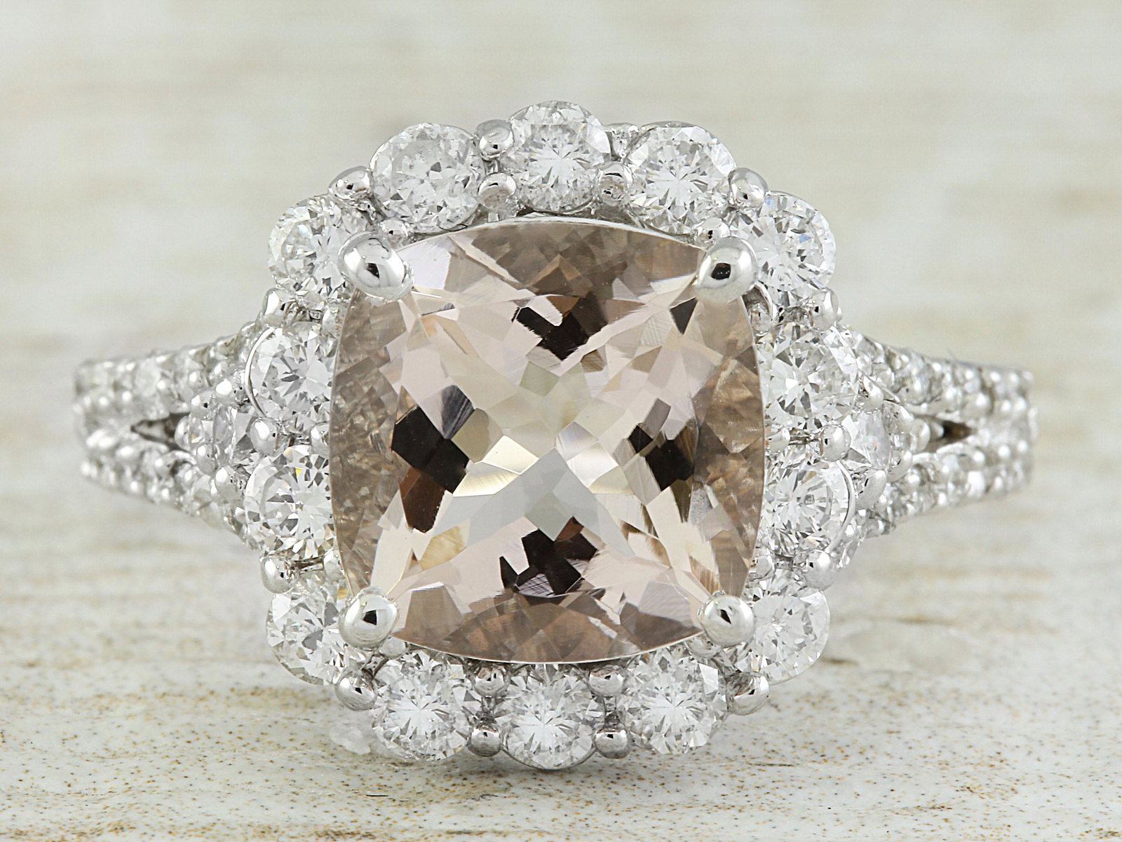3.70 CTW Morganite 14K White Gold Diamond Gold Ring: 3.70 CTW Morganite 14K White Gold Diamond Gold Ring Manufacturer's Suggested Retail Price: $ 3500.00 Stamped: 14K Total Ring Weight: 5 Grams Morganite Weight: 2.60 Carat (9.00x9.00 Millimeters) Diamon