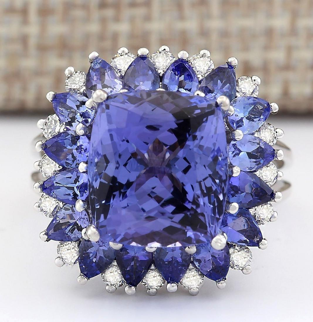 9.14 CTW Natural Blue Tanzanite And Diamond Ring 14k: 9.14 CTW Natural Blue Tanzanite And Diamond Ring 14k Solid White Gold Manufacturer's Suggested Retail Price: $ 7900.00 Stamped: 14K Ring Size: 6.25 Total Ring Weight: 11.1 Grams Diamond Weight: Total 