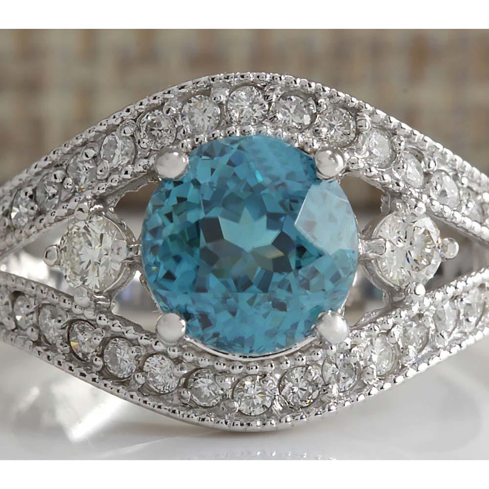 4.16 CTW Natural Blue Zircon And Diamond Ring 14K Solid: 4.16 CTW Natural Blue Zircon And Diamond Ring 14K Solid White Gold Manufacturer's Suggested Retail Price: $ 3000.00 Stamped: 14K Ring Size: 7.25 Total Ring Weight: 5.5 Grams Diamond Weight: Total Natu