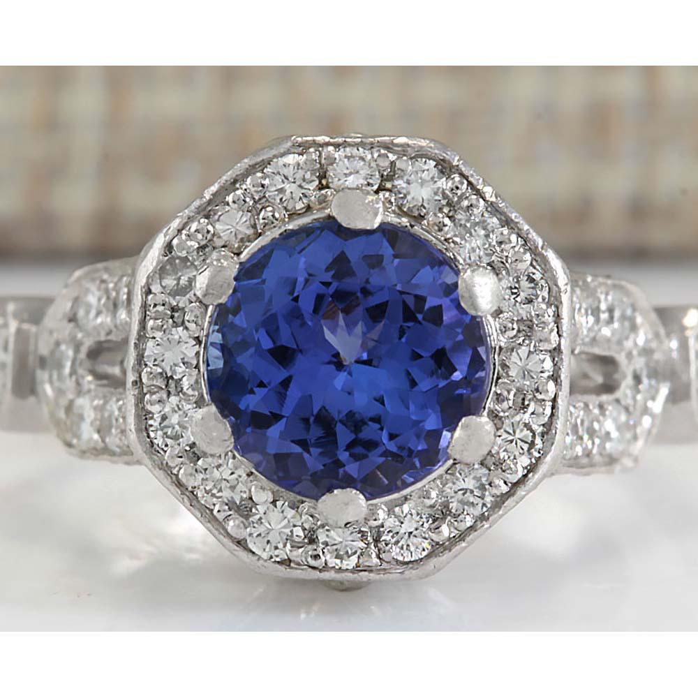 2.50 CTW Natural Blue Tanzanite And Diamond Ring In Platinum: 2.50 CTW Natural Blue Tanzanite And Diamond Ring In Platinum Manufacturer's Suggested Retail Price: $ 4400.00 Stamped: 18K Ring Size: 3.75 Total Ring Weight: 8.9 Grams Diamond Weight: Total Natural di