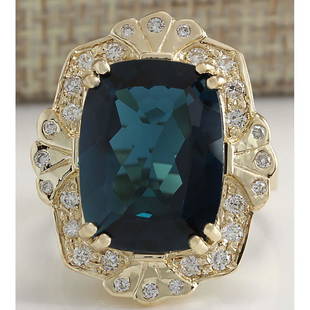 11.39CTW Natural London Blue Topaz And Diamond Ring In18K Solid Yello Gold: 11.39CTW Natural London Blue Topaz And Diamond Ring In18K Solid Yello Gold Manufacturer's Suggested Retail Price: $ 3700.00 Stamped: 18K Ring Size: 7 Total Ring Weight: 11 Grams Diamond